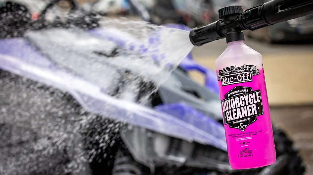 Muc-Off Motorcycle Cleaner attached to a hose